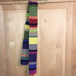 Vibrant custom scarf doubles as hand warmer!